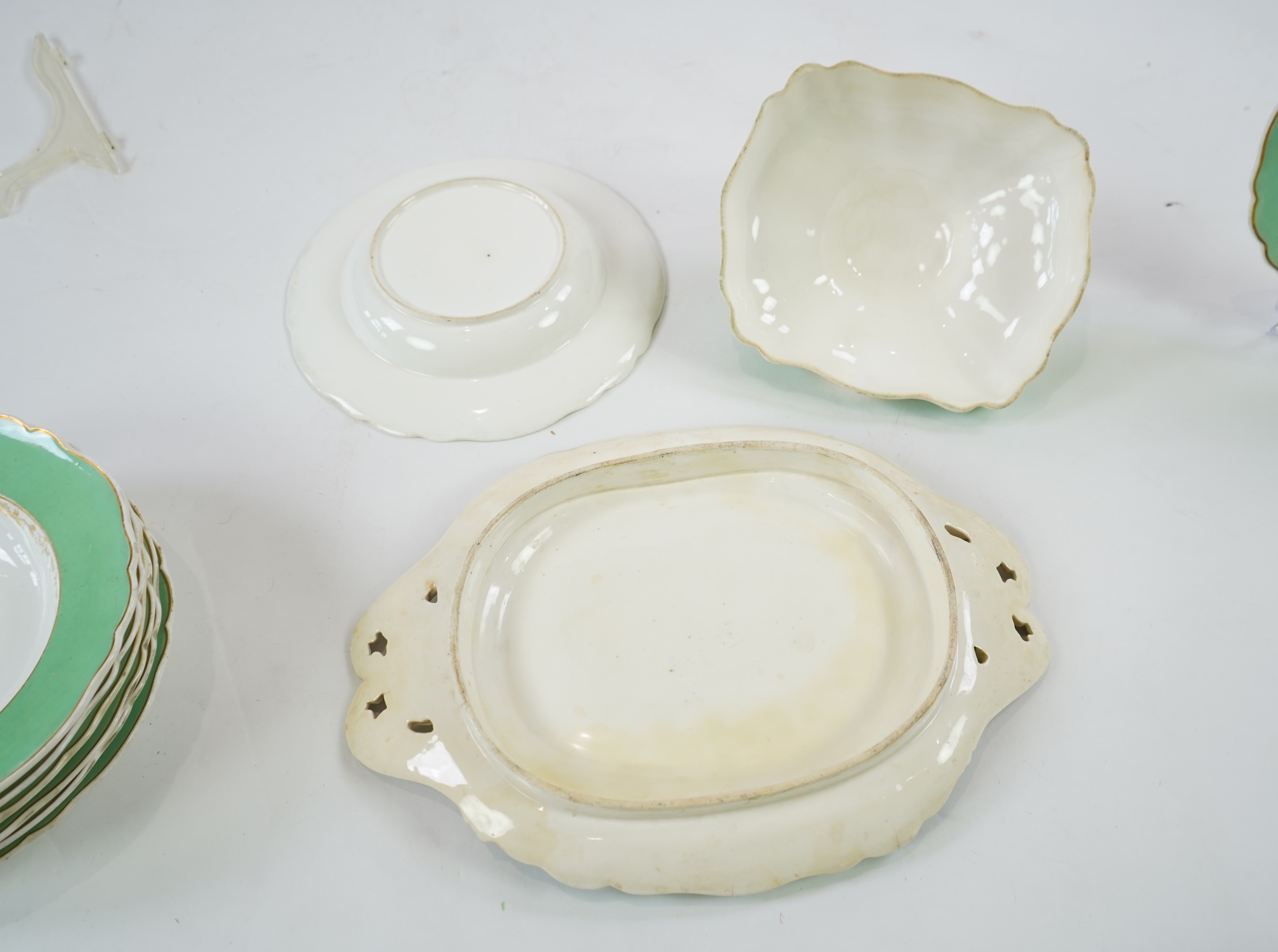 An English porcelain Turks head crested part dinner service, c.1830